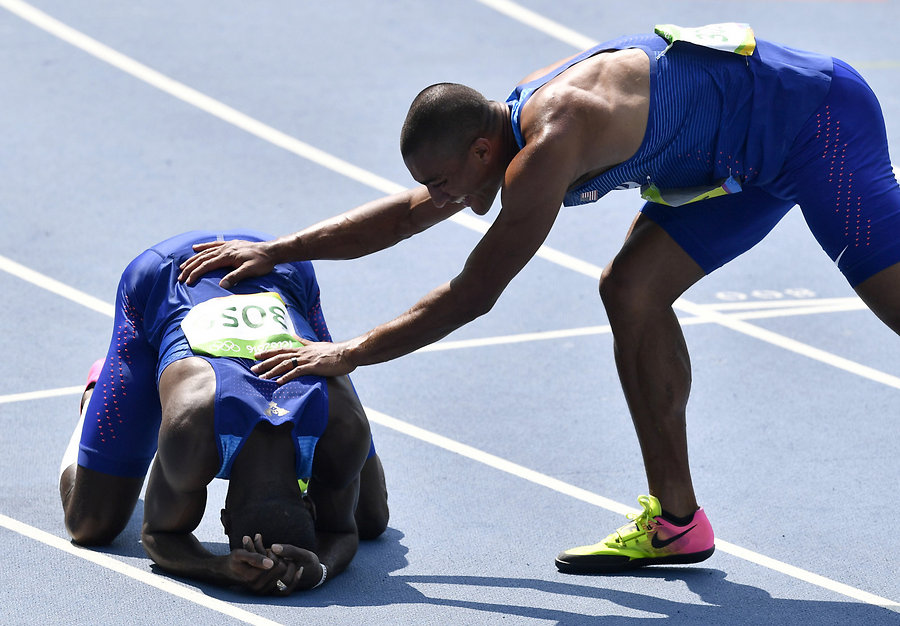 After Javier Culson’s false start in the 400-metre hurdles final Ashton Eaton asked Culson to be allowed to compete. After race he was first cheering Clement and other hurdlers. Photo - AP